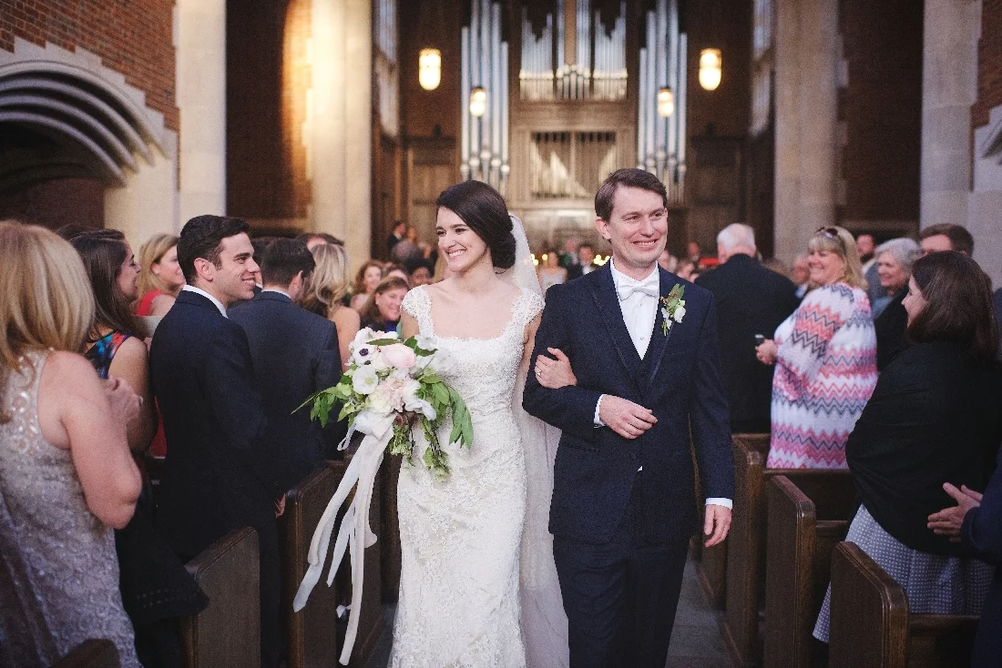 bride and groom leaving ceremony.jpeg