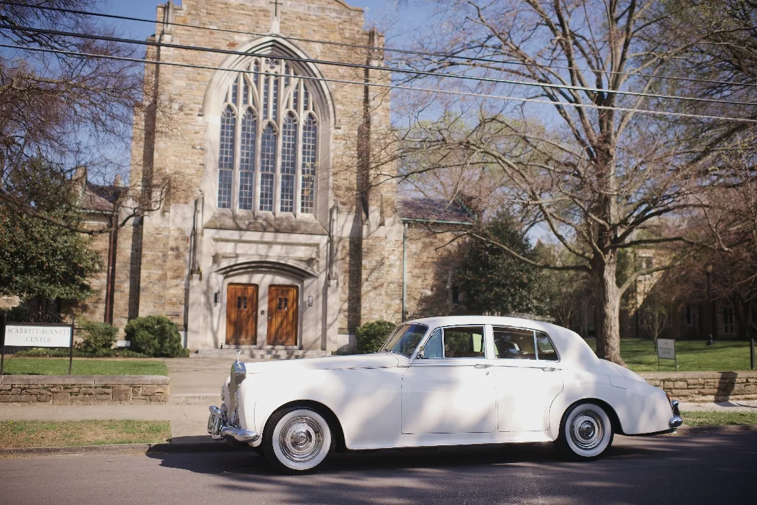classic car outside church.jpeg
