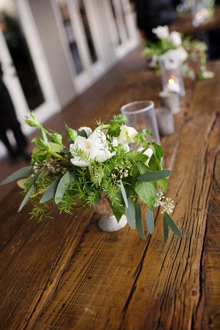 bar table with candles and flowers.jpeg