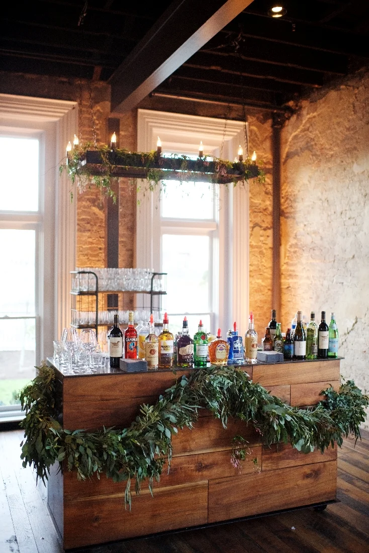 beautiful bar with greenery and lighting.jpeg