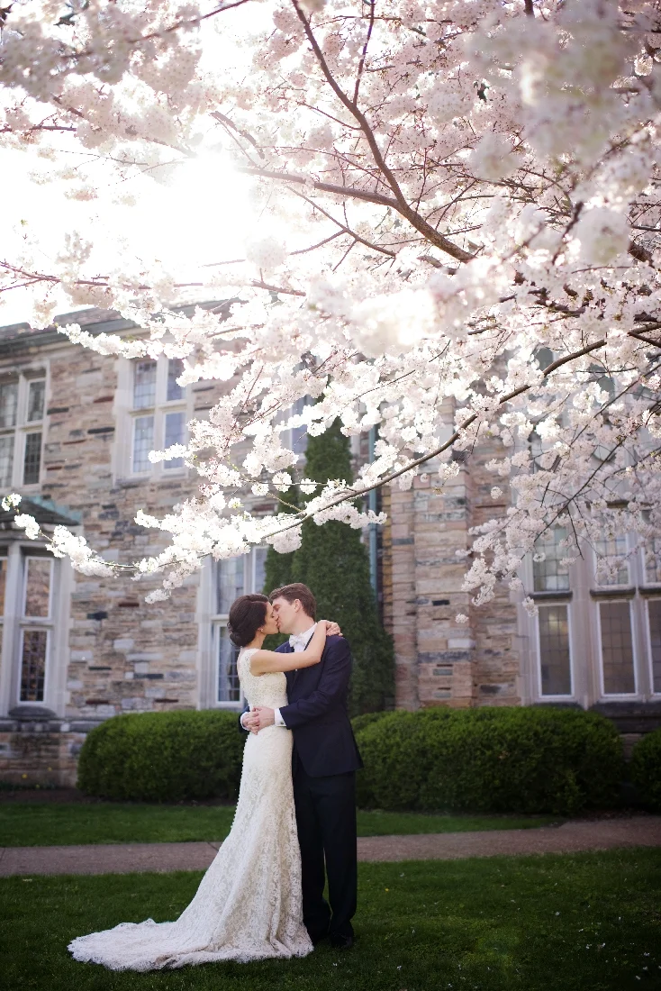 bride and groom kissing springtime.jpeg
