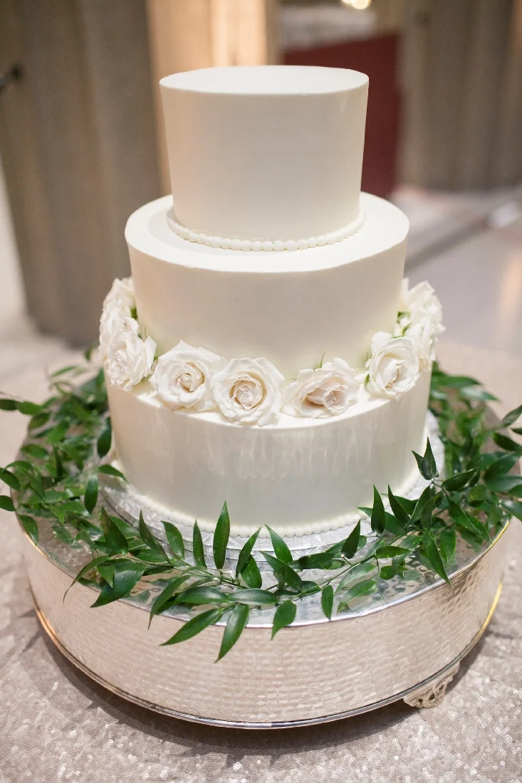 wedding cake roses greenery.jpeg