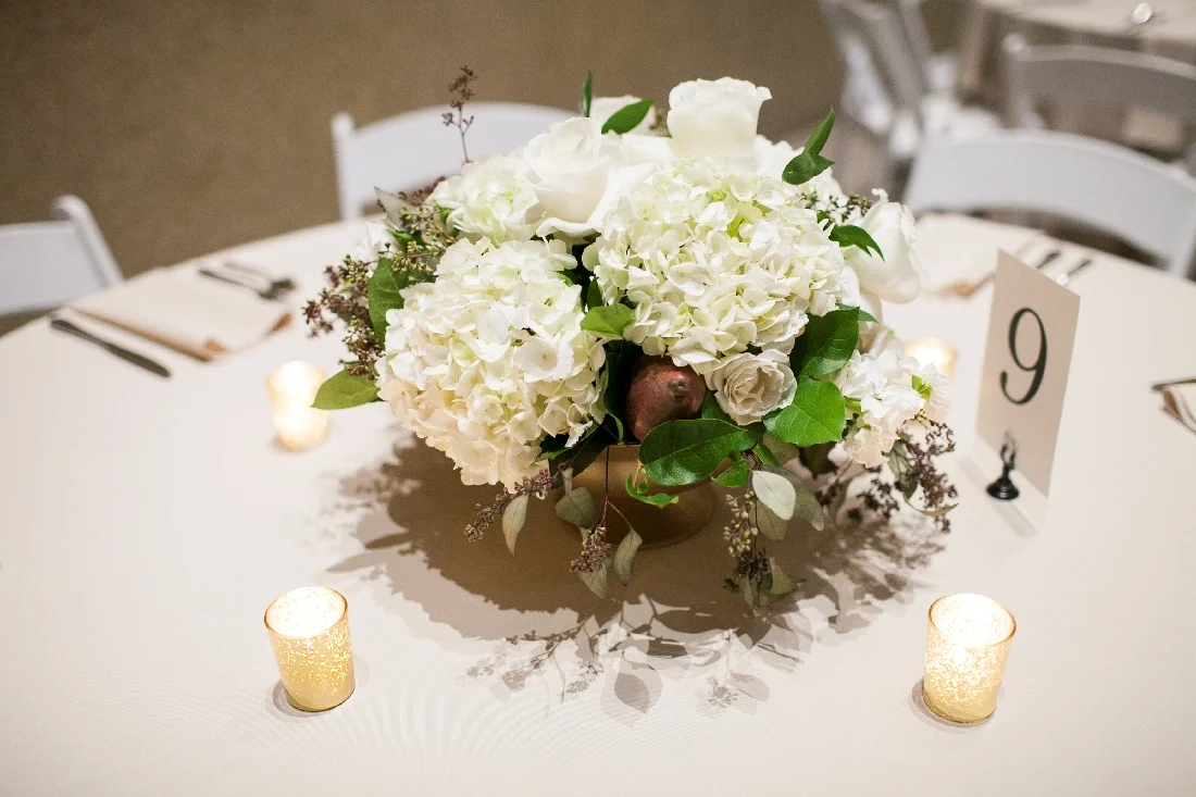 white centerpiece reception.jpeg