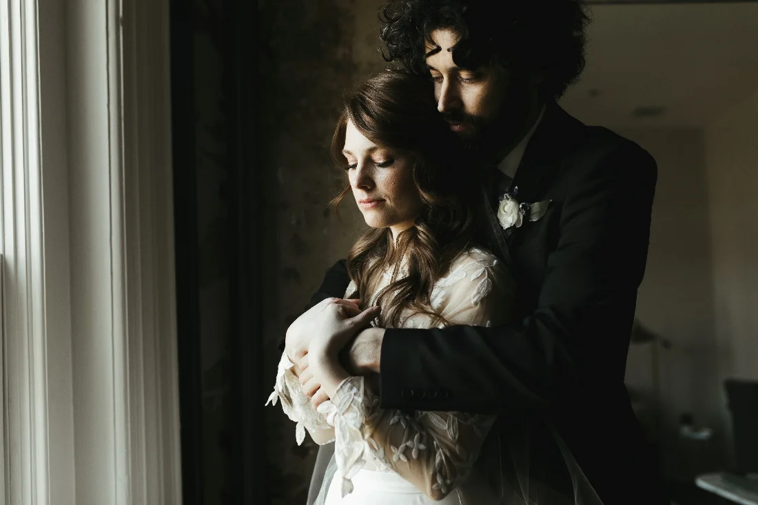 bride and groom hugging.jpeg