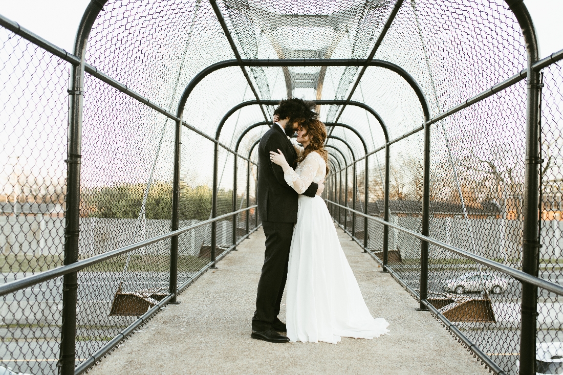 bride and groom on bridge.jpeg