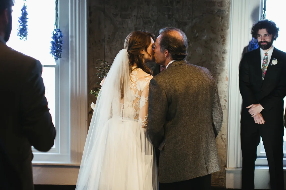 bride kiss by father.jpeg