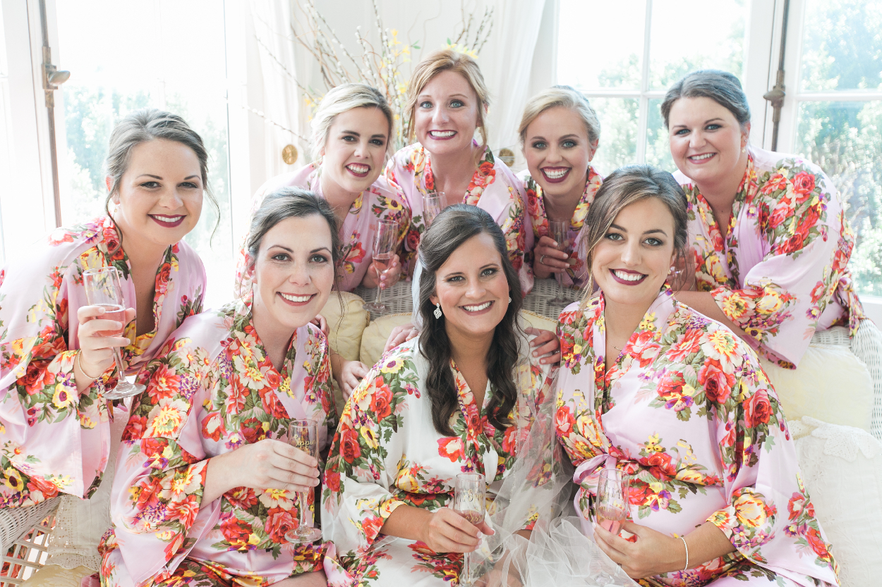 bridesmaids in flower robes.jpeg