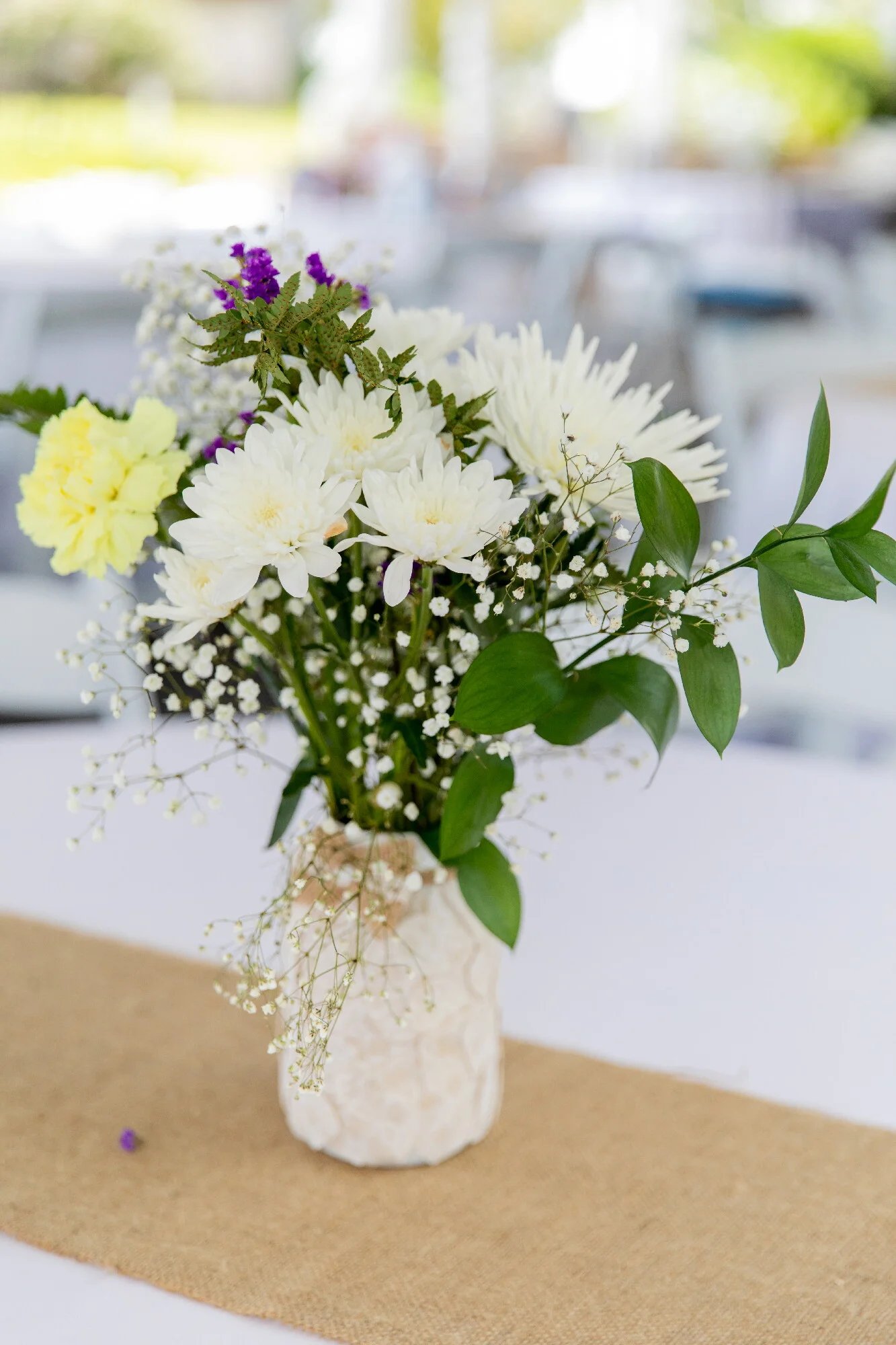 centerpiece wildflowers in mason jars(1).jpeg