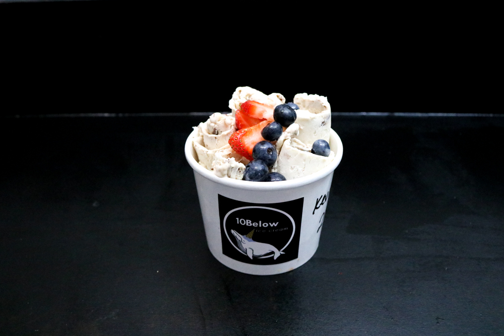 Monkey Business, Hazelnut, Banana, and Chocolate Syrup - Bibi's choice of toppings are strawberries and blueberries.