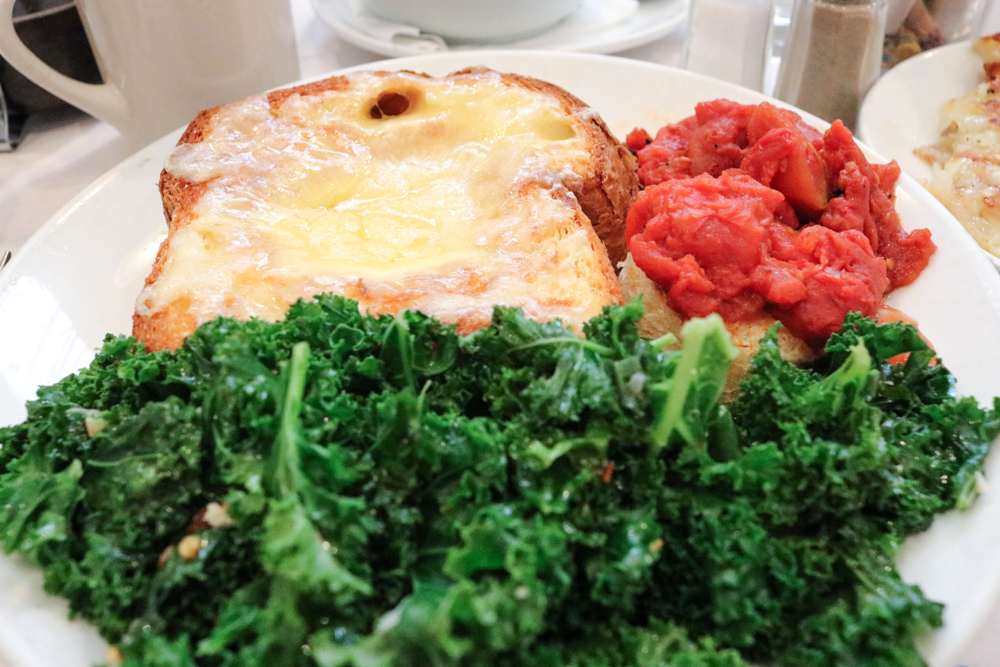 Egg Rothko, Easy-cooked egg in a slice of Amy’s brioche and topped with Grafton cheddar. Served with broiled tomatoes and a side of meat or seasonal vegetables