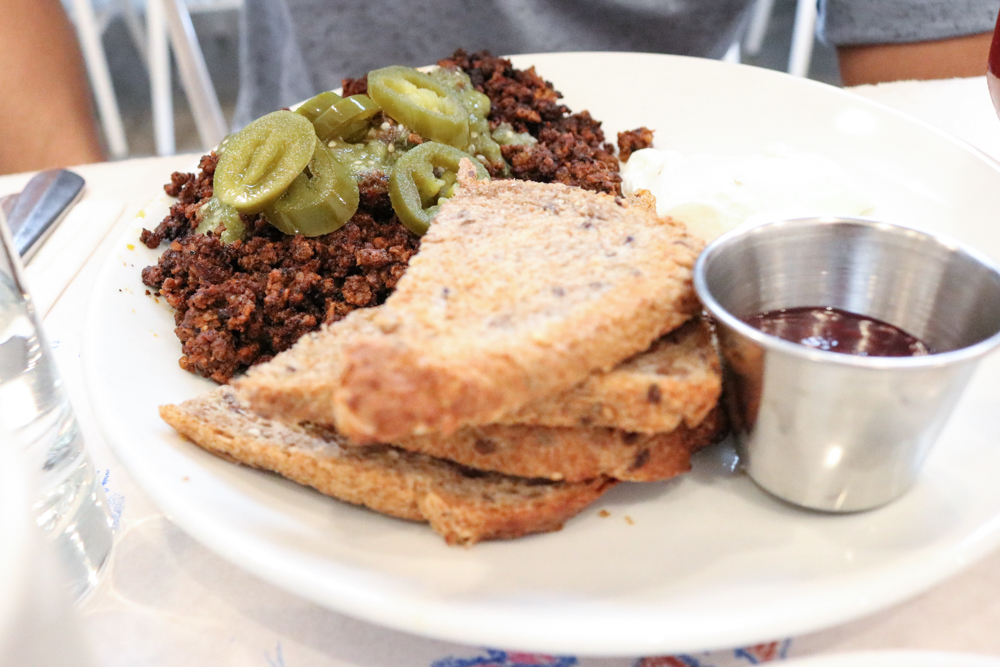 Chorizo & Eggs, Home-made chorizo with eggs any style, salsa verde, pickled jalapenos, and toast