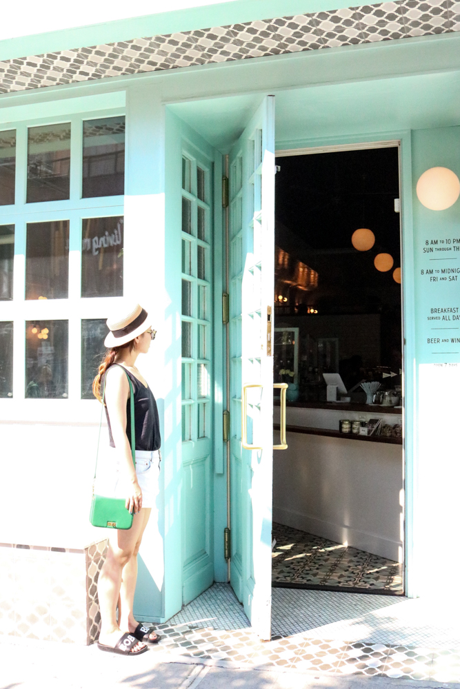 Urbanoutfitters Hat , Wildfox Classic Fox Wayfarer Mirror Sunglasses , Everlane Cotton Tank , Levis Shorts, (Bobo and Bibi) Mi Adilette - Your Call Slippers, J Crew Bag