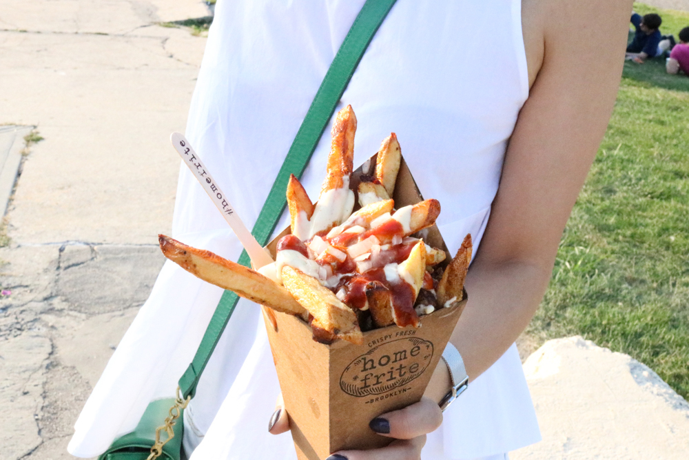 Home Frite (Hand Cut Fries ) - Dutch, House-made curry ketchup, lemon garlic aioli, and freshly chopped white onions, all served over a bed of crispy hot fries from Smorgasburg