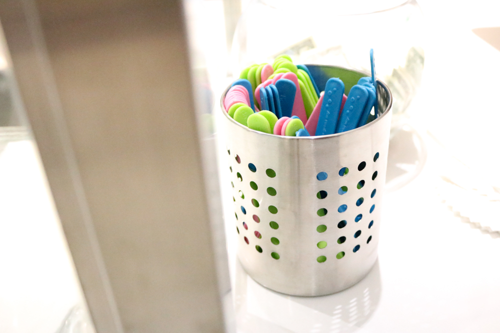 Colorful spoons at -321° Ice Cream Shop