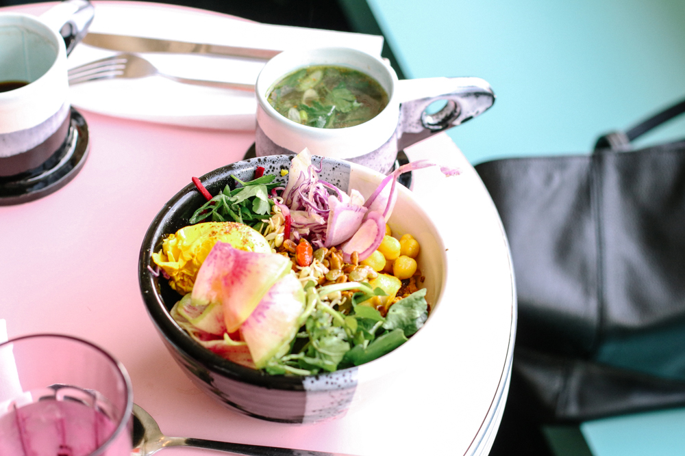 Dragon Bowl, coconut grains, roasted vegetables, fresh greens, pickles, house sprouts + herbs sauce: chili + bone broth | add on: turmeric poached egg
