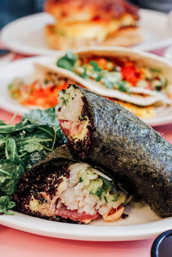 Tuna Nori Wrap, black rice / avocado / chili cucumber / daikon wasabi creme fraiche / sesame