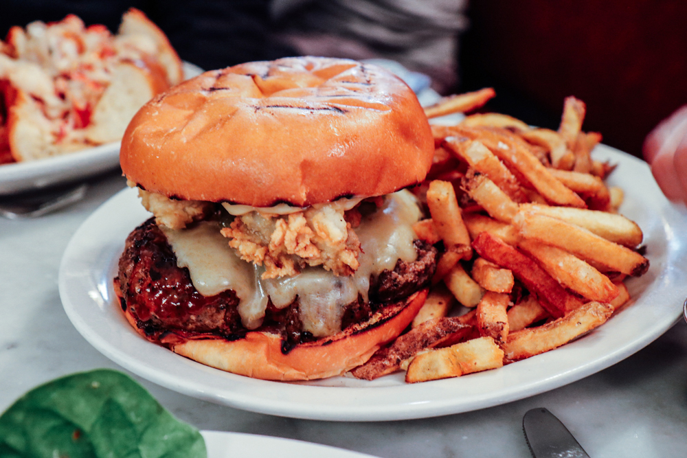 Naptune Burger, cheddar, fried oysters, garlic mayo, relish*