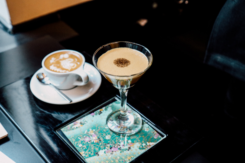 Signature Drink, cold espresso served in martini glass accompanied with small cappucino