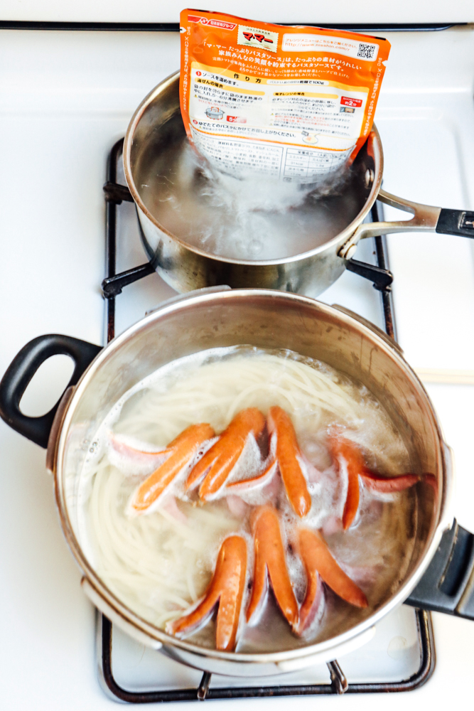 Cook Neapolitan Sauce in boiling water according to the package while spaghetti is being cooked.