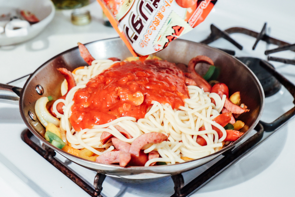 Then add cooked Neapolitan Sauce in.