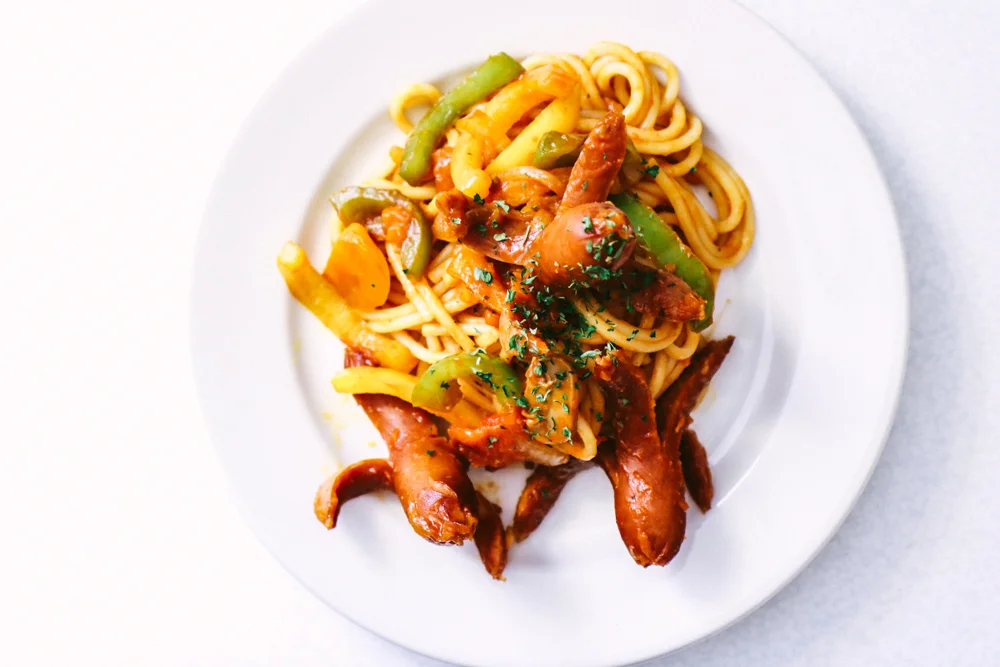 Divide pasta in bowls and top with parsley and cheese if you wish.