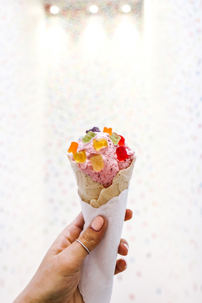 Strawberry with mini gummy bears on french vanilla cone at Cool Mess