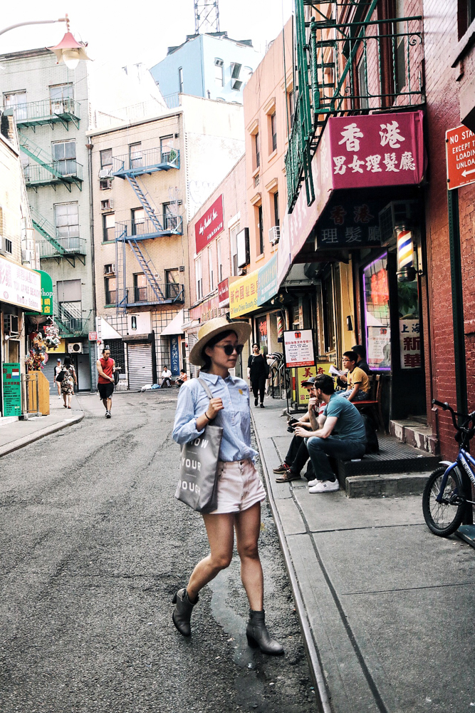 Janessa Leone Hat, Illesteva Sunglasses, Muij Shirt, Levis Jean, Everlane Bag, Helmut Lang Boots