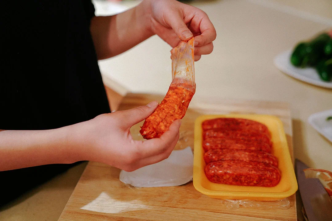 Peel the skin off of a Italian Sausage to get the minced meat only.