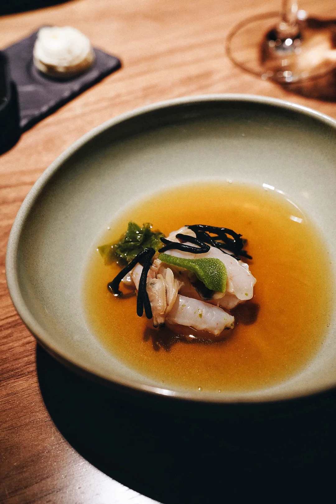 Seafood and fish soup with seaweed