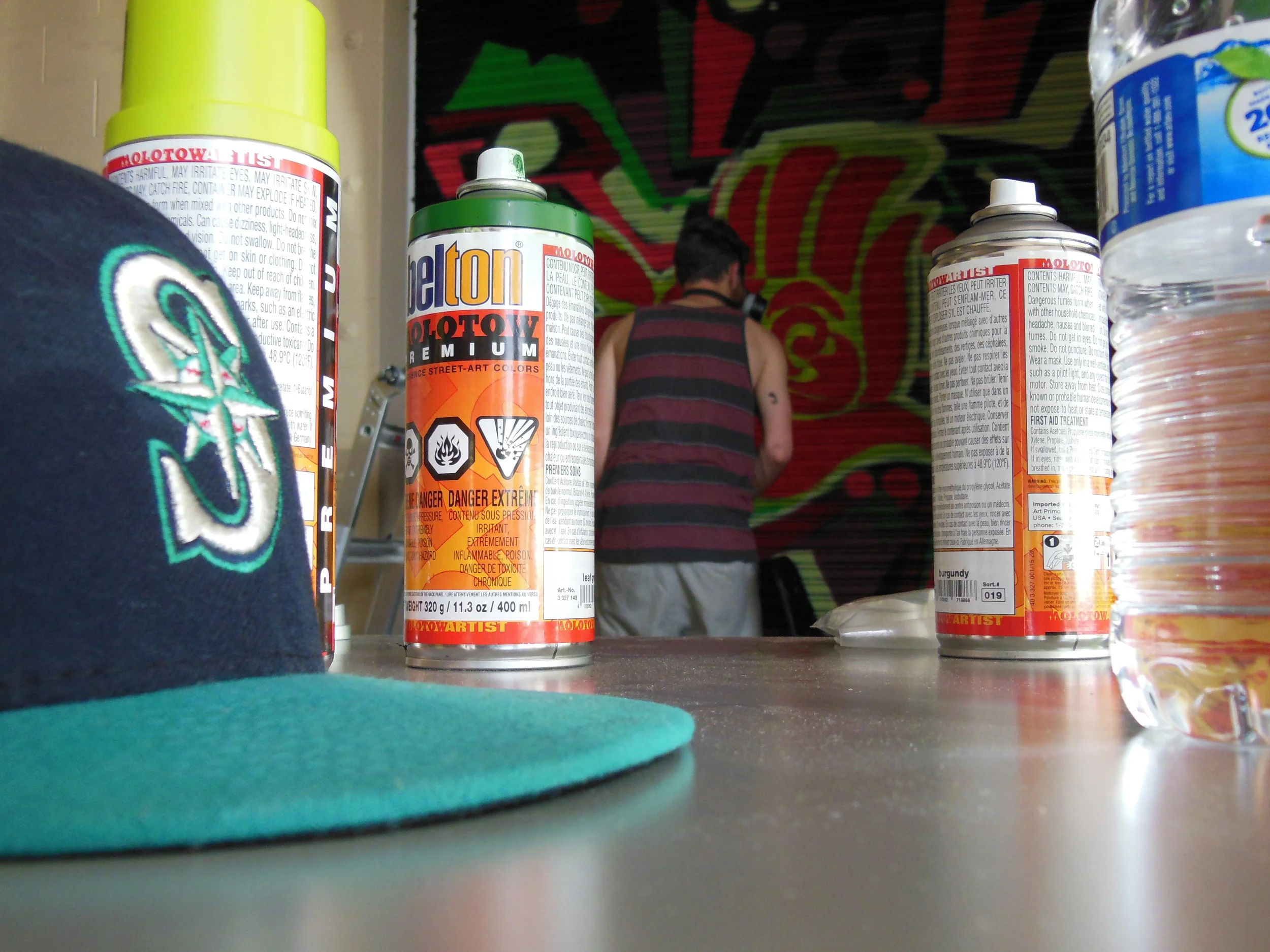 MYP volunteer Alex Southworth paints a mural in the Rosewood community during MYP's Hip Hop program in East Portland. 