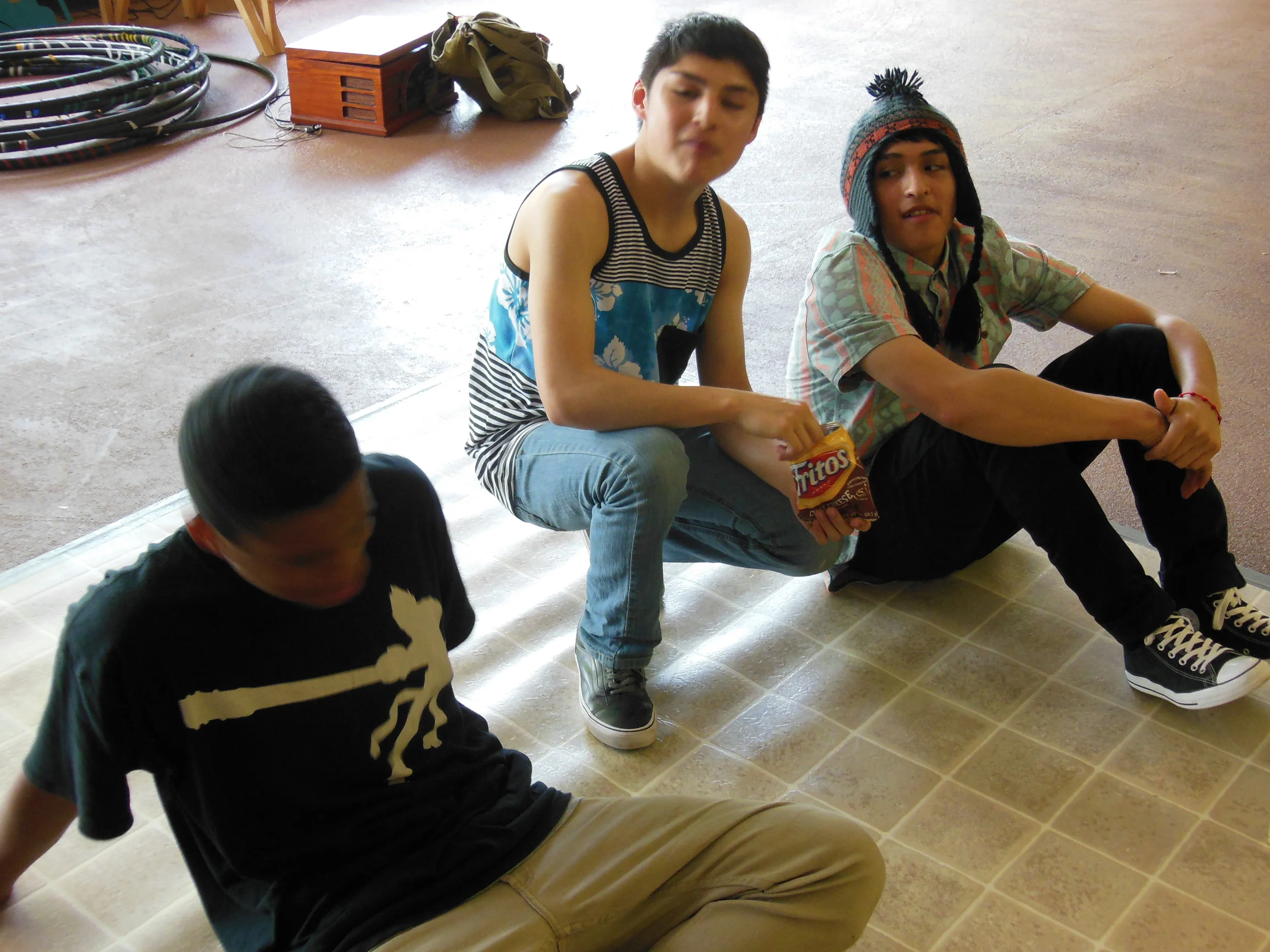 Bboy's taking a breather from breakdancing during MYP's Hip Hop program in East Portland. 