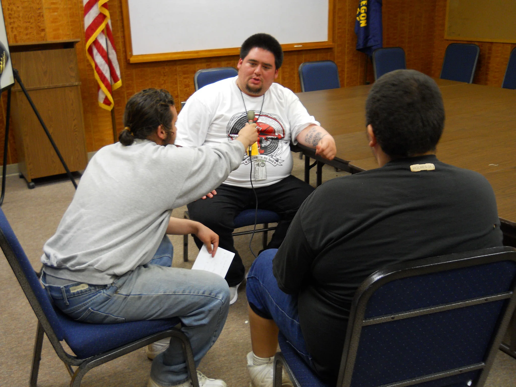 Youth at MacLaren Youth Correctional Facility in Woodburn, Oregon interview one of their guests during MYP's radio journalism group. 