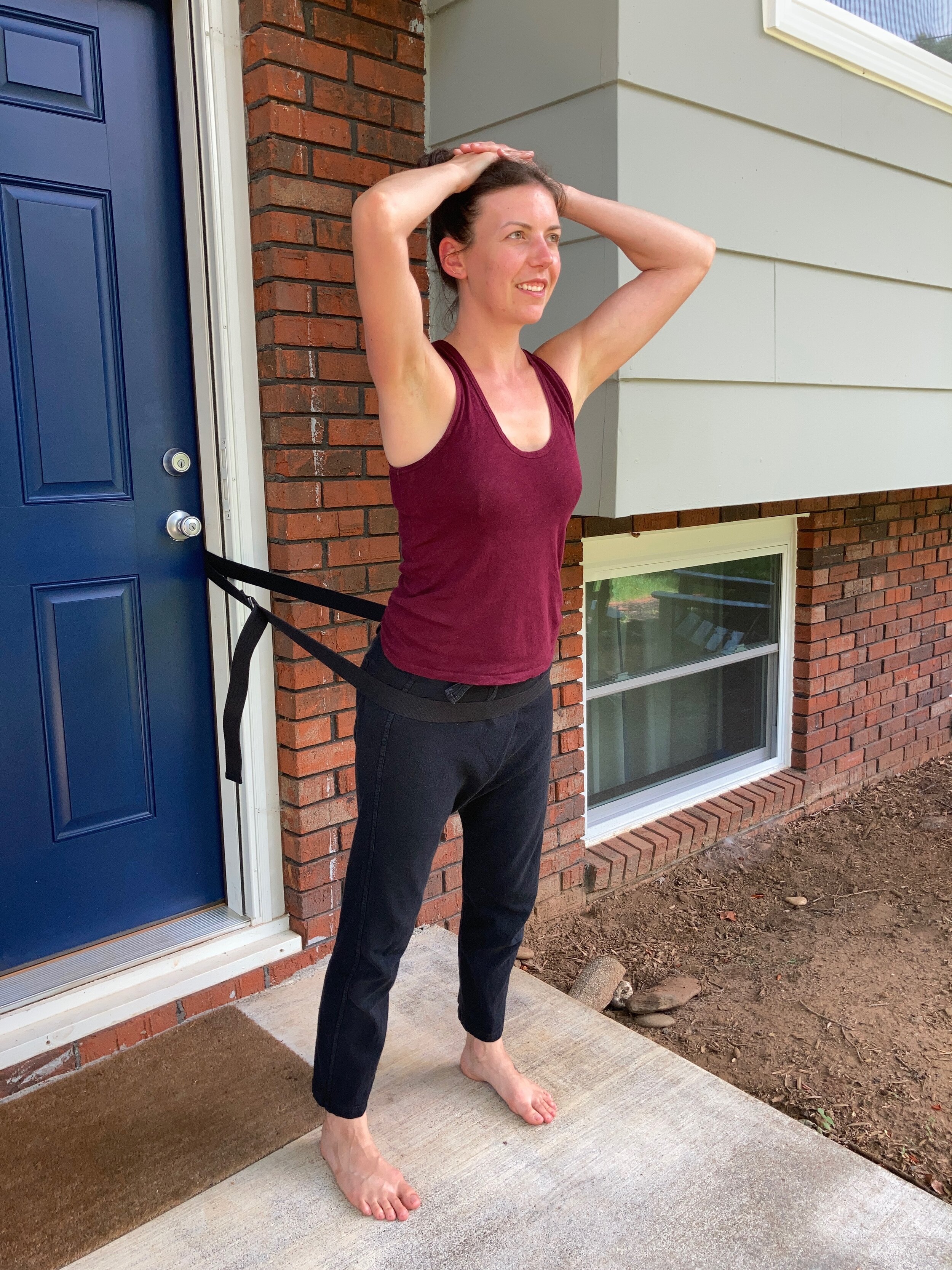 How to Use a Yoga Strap for Back Traction — KindBody Movement