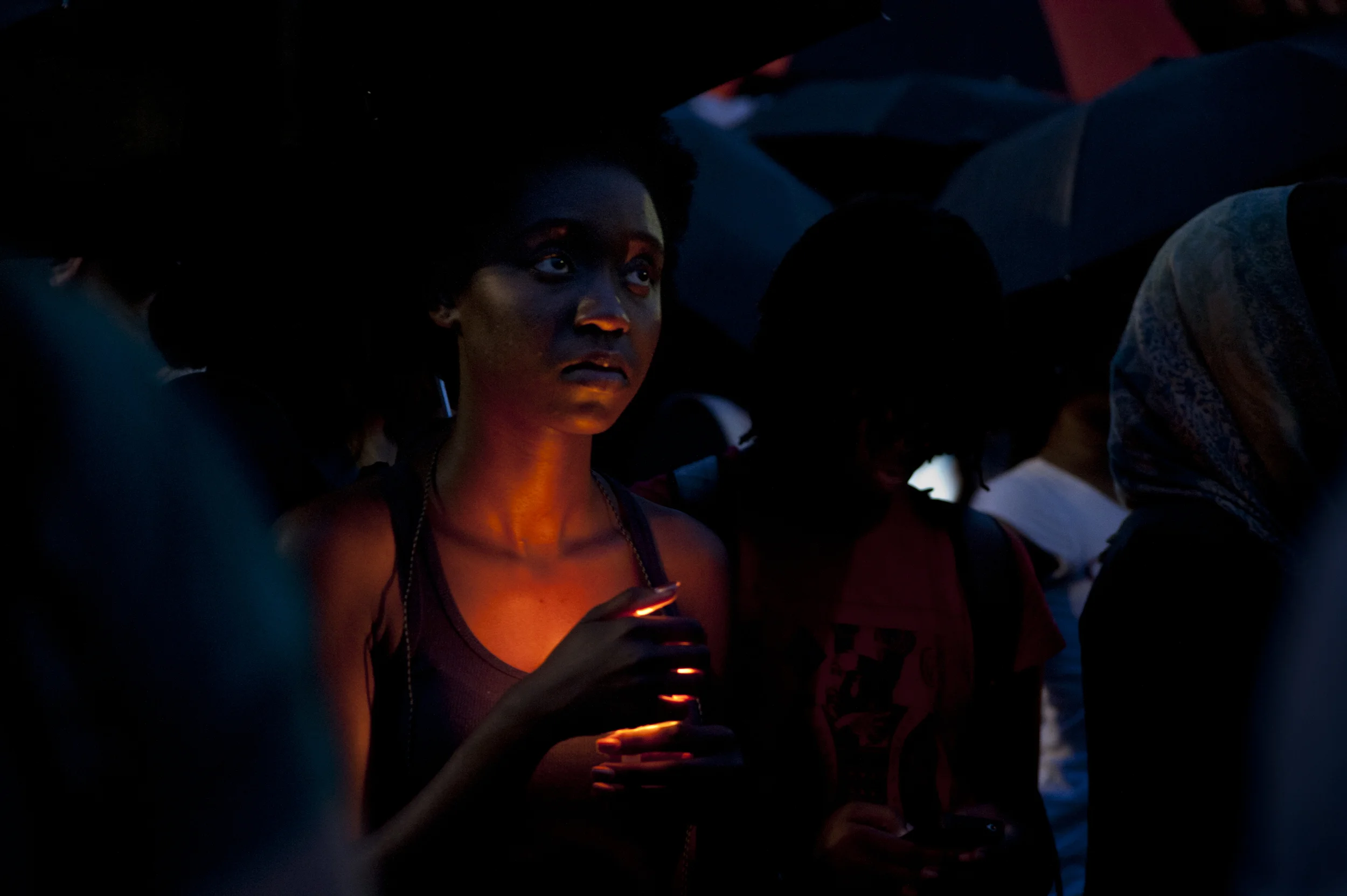 A protester holds candlelight vigil at a Troy Davis Execution Protest in Washington DC.
