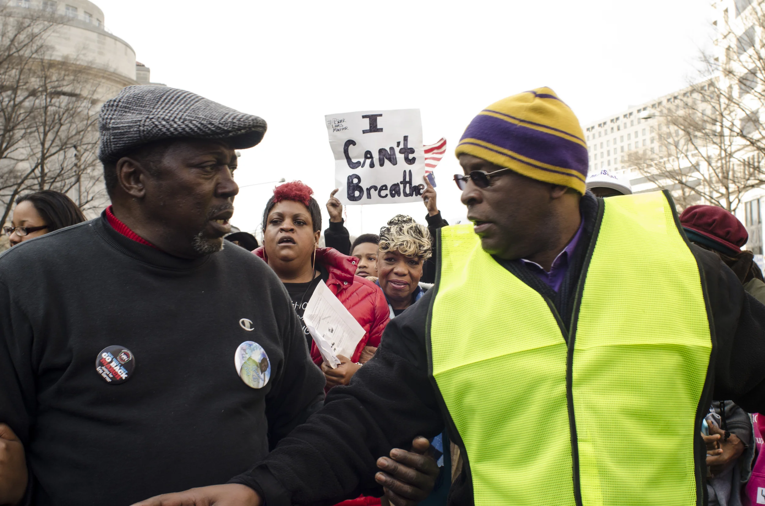  Glenn Carr (2R), mother of Eric Garner, marches in the National March Against Police Violence on December 13, 2014 in Washington D.C. The march was organized by Rev. Al Sharpton's National Action Network to bring attention to recent deaths at the ha