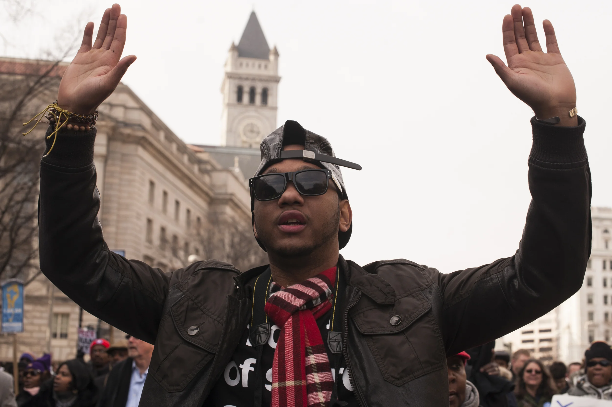  A protester marches in the National March Against Police Violence on December 13, 2014 in Washington D.C. The march was organized by Rev. Al Sharpton's National Action Network to bring attention to recent deaths at the hands of the police. 