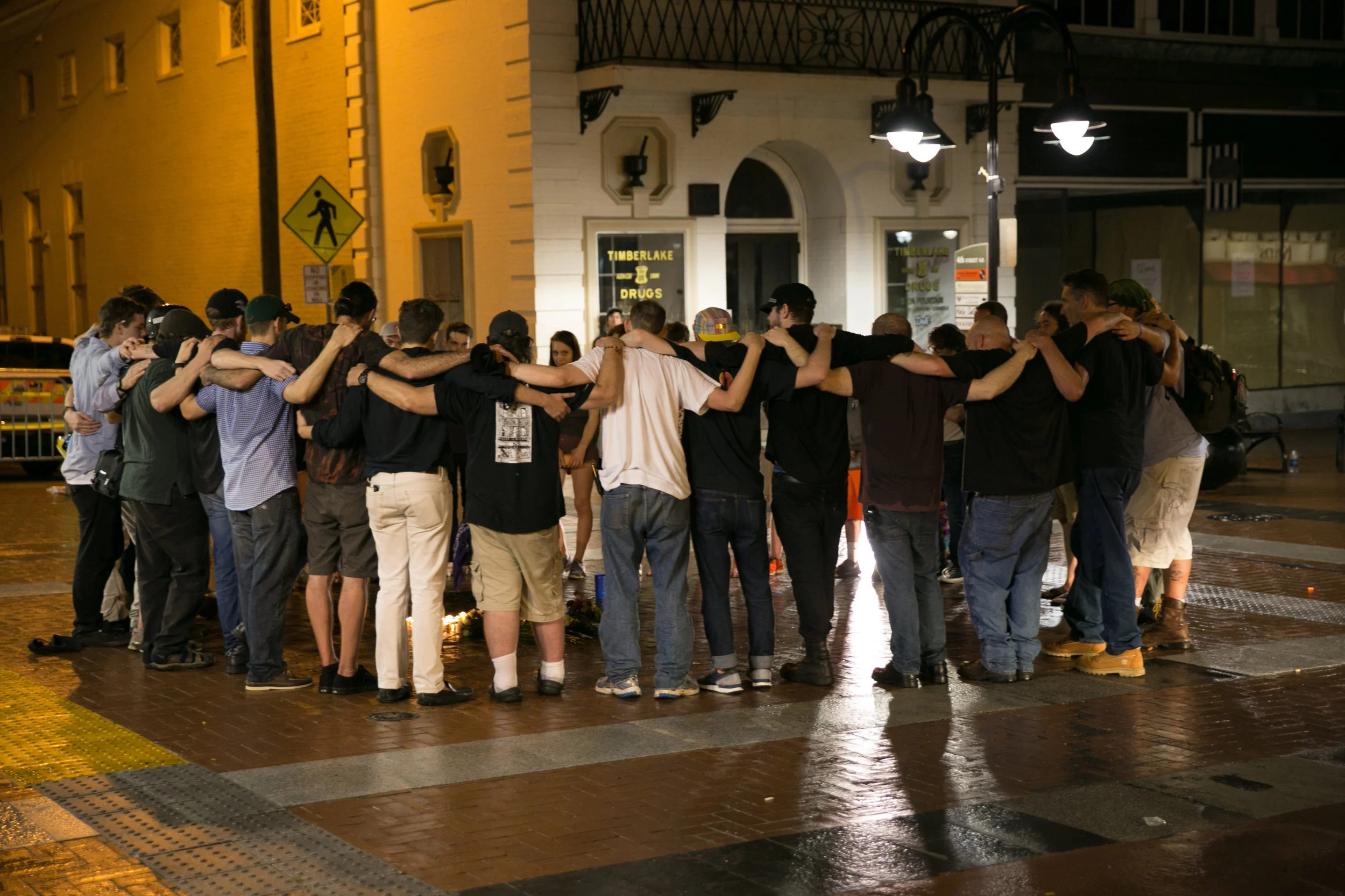 Vigil in Charlottesville, Va, after the attack the left Heather Heyer dead and 19 others injured.