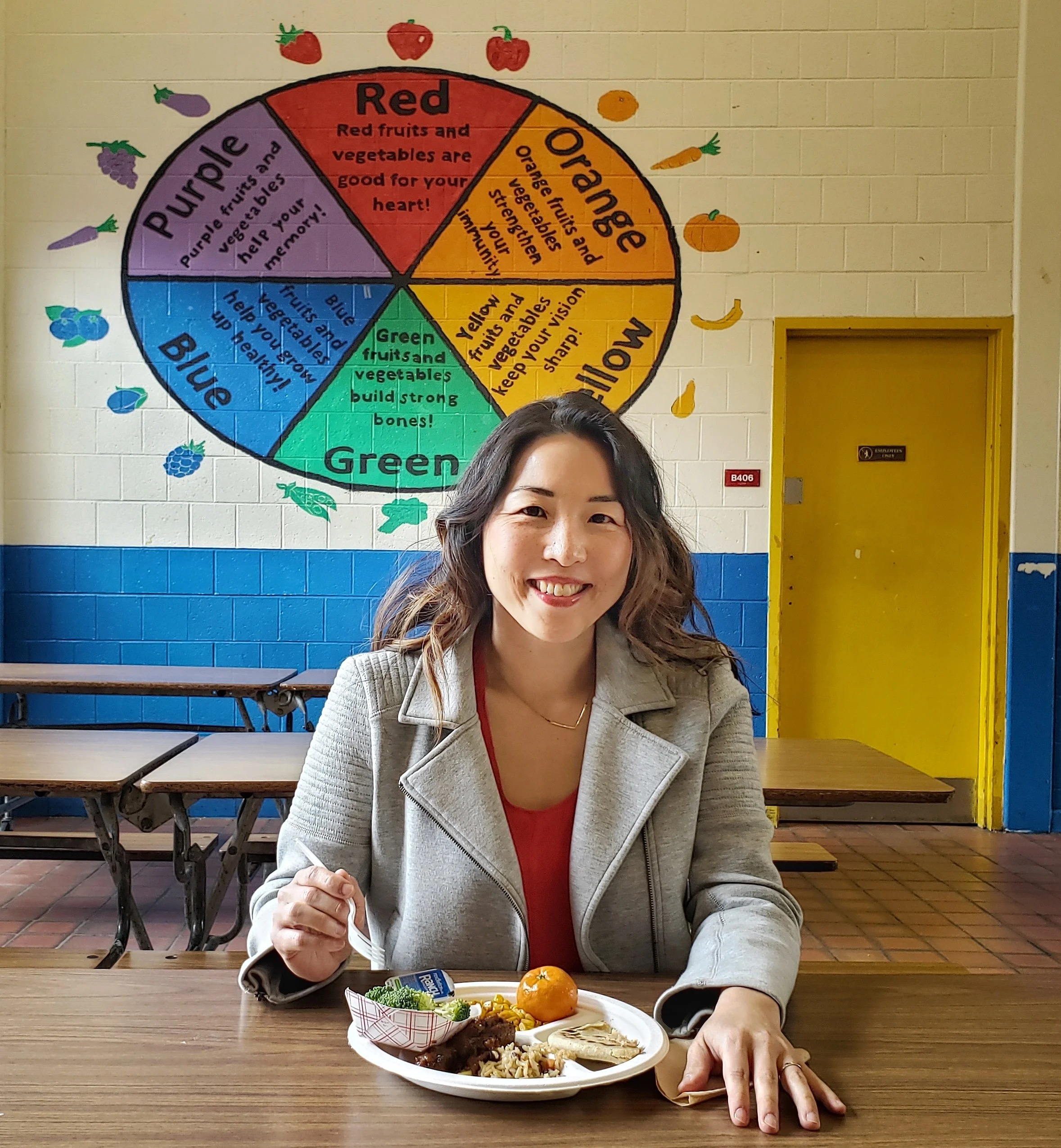 Christine tucking in to a Revolution Food school lunch (best school lunch she’s ever had!)