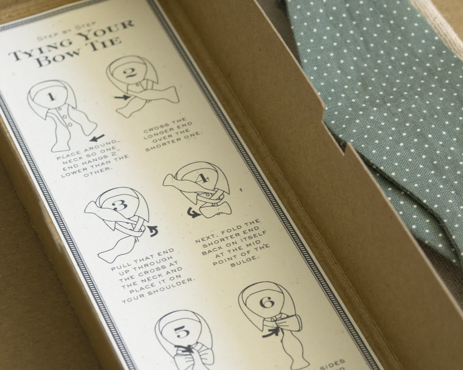 Illustrated instructions to tie your Tie are found inside the top of the packaging.