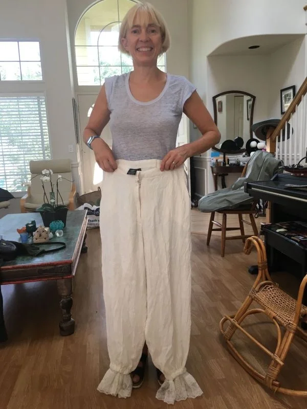 Artist Maura Donegan holds up pants-turned-into-bloomers. Credit: Mary Coss