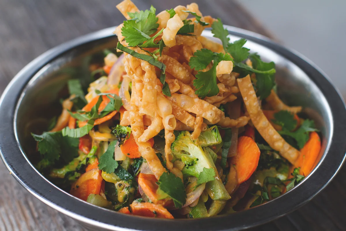 Coconut-Curry (*V/*GF) $12 SAUTEED SEASONAL, RED CURRY, GINGER, BASIL, CILANTRO, WONTON CRISPS