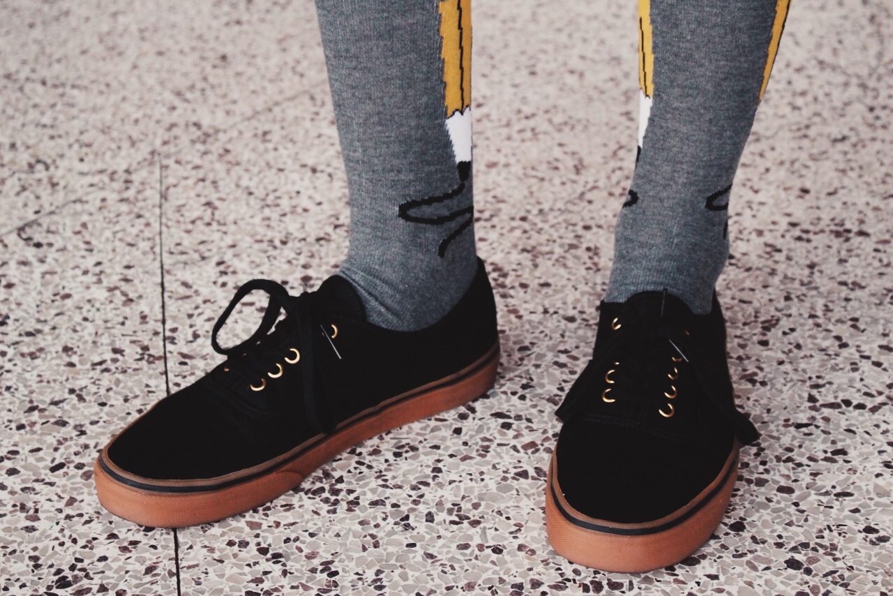 These Target pencil socks are a great way to add a dash of flair to an outfit and make for a great conversation piece. These classic black vans can be dressed both up and down.