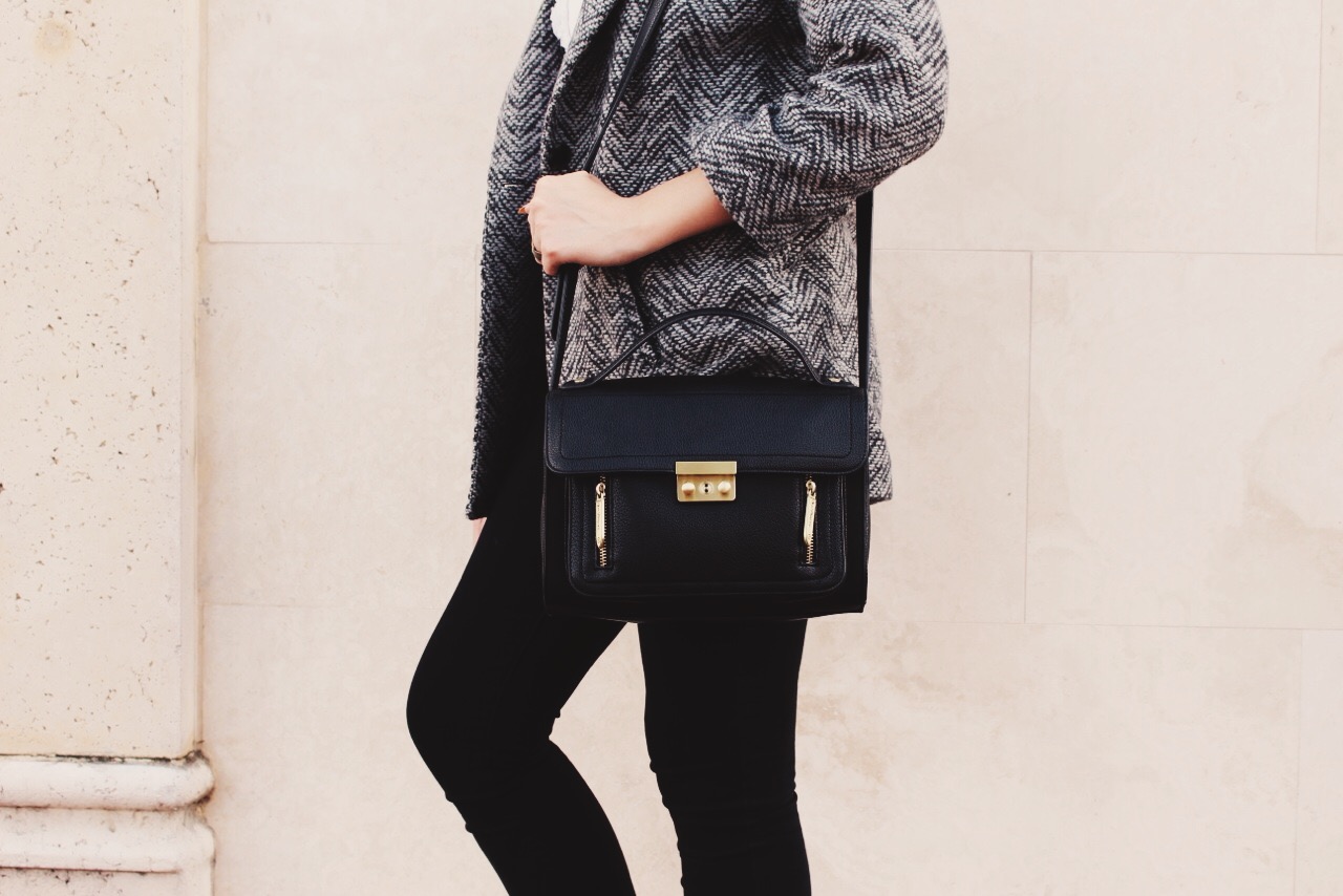 A black cross body satchel is both classic and functional. I wear this 3.1 Phillip Lim for Target bag all the time.