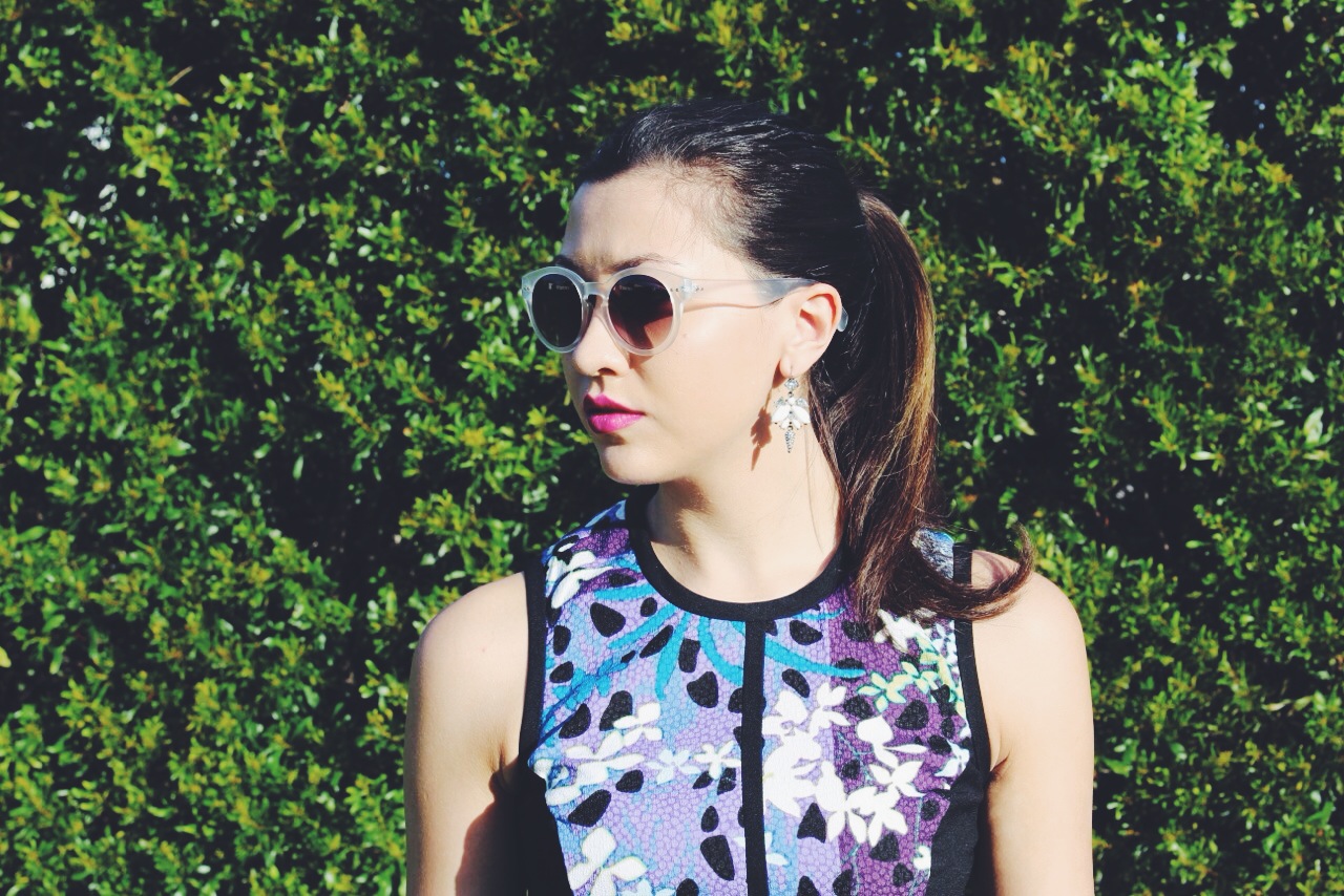 I kept my hair and makeup simple, opting for a slicked back ponytail so nothing would interfere with the high neckline of the dress. I accented the cool tones in the dress with a purplish pink lipstick in Spitfire by MAC.