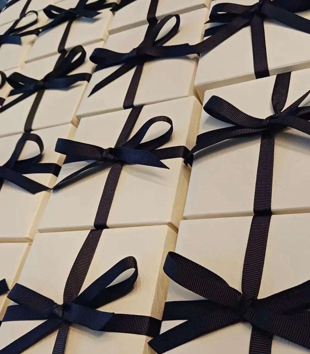 ivory box with black ribbon.jpeg