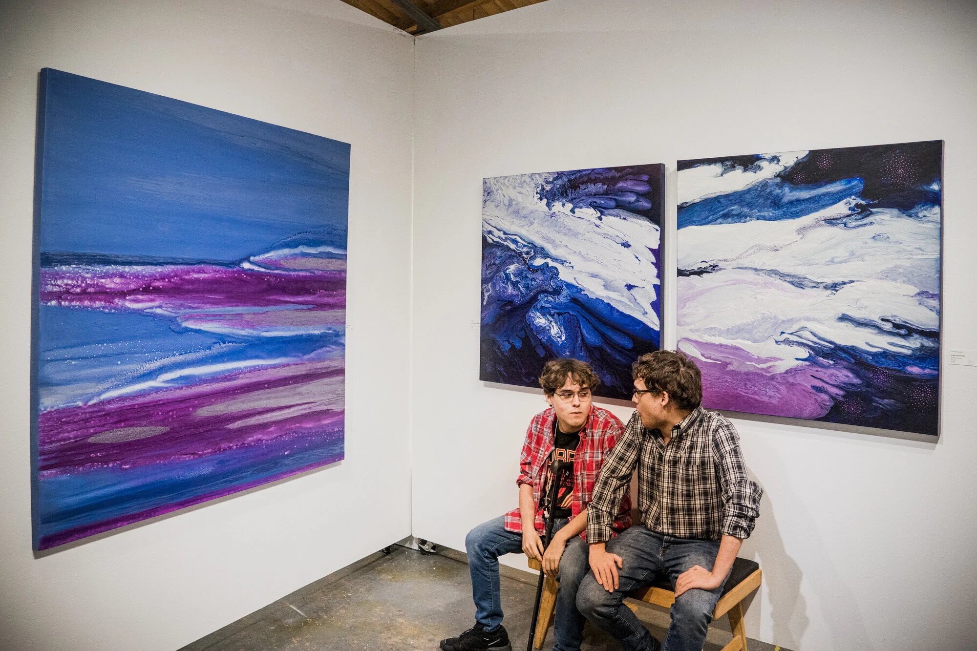 My sons sitting under my work in Dart Gallery.