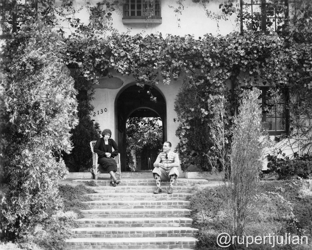  Elsie Jane Wilson and Rupert Julian at home at 2130 Vista Del Mar (the former Krotona Court) in Los Angeles, CA.  Inscription on reverse reads 'To dear Sister Blossom, from Brother & Wife taken when sister was visiting Hollywood years ago.  Photogra