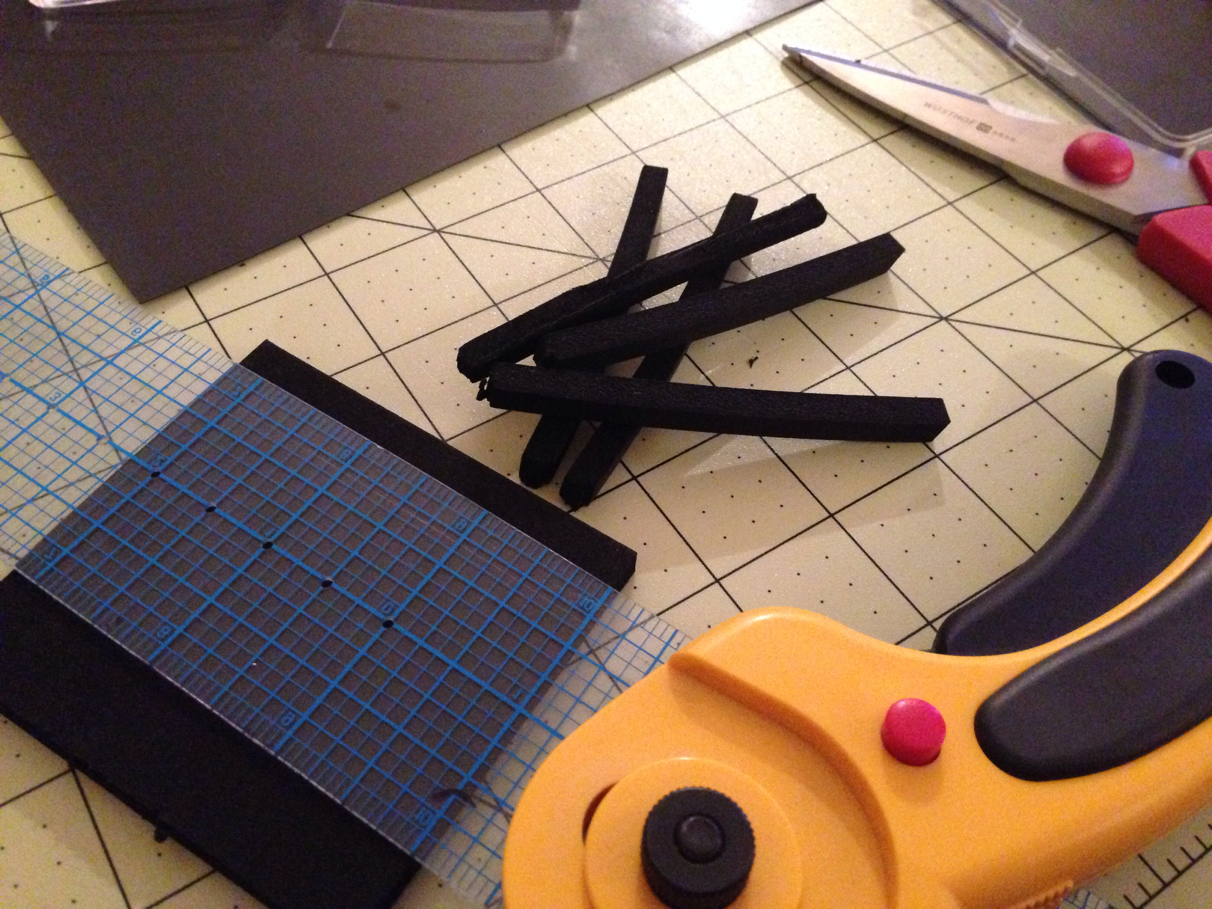 Measure and cut, using the straight edge, 2-3 foam strips. I recommend fitting and trimming before gluing. 