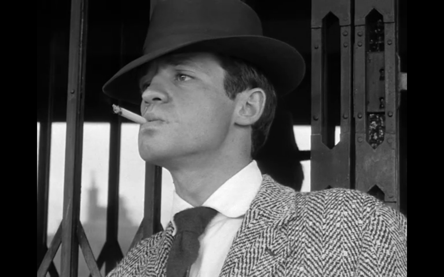 Jean-Paul Belmondo as Michel Poiccard.