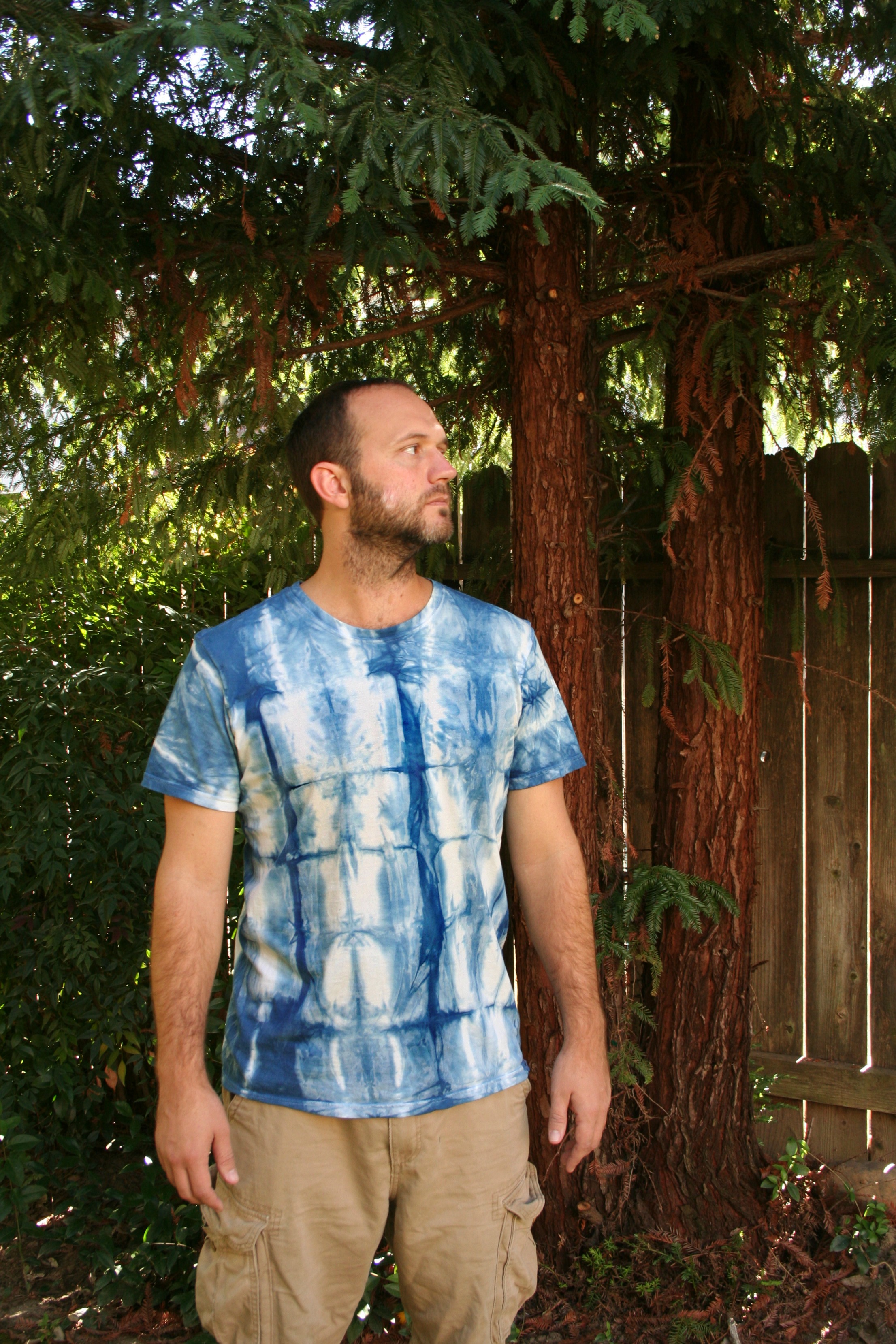 Excessively studly gentleman with shibori dyed tee shirt! Facial expression does not indicate level of satisfaction, much.
